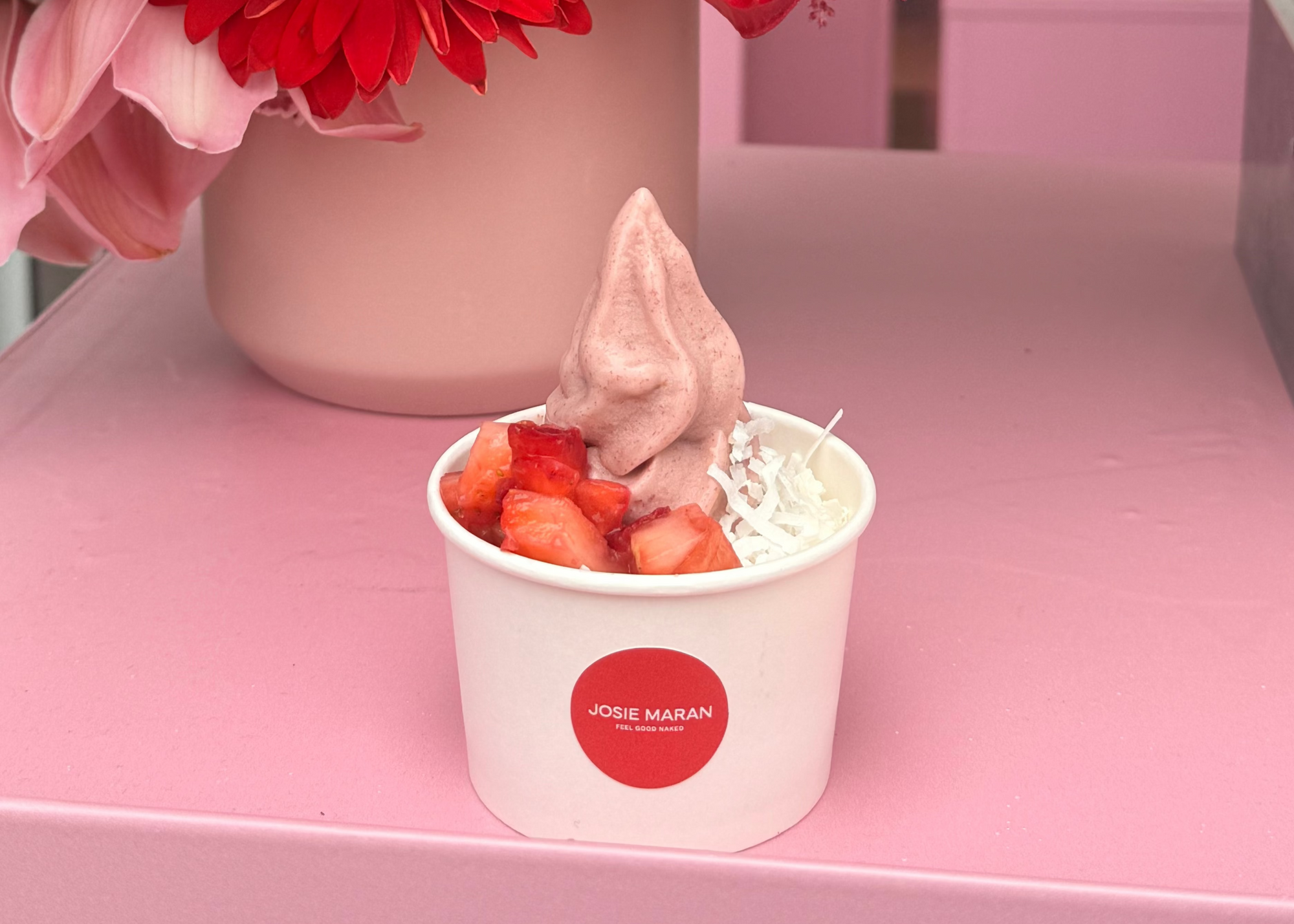 strawberry soft serve from Peel with Josie Maran topped with strawberries and coconut flakes